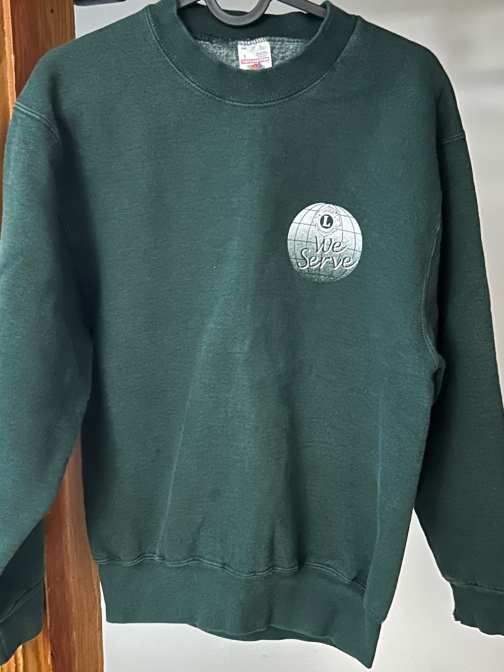 Forest Green Crewneck Sweatshirt with 'We Serve' Emblem